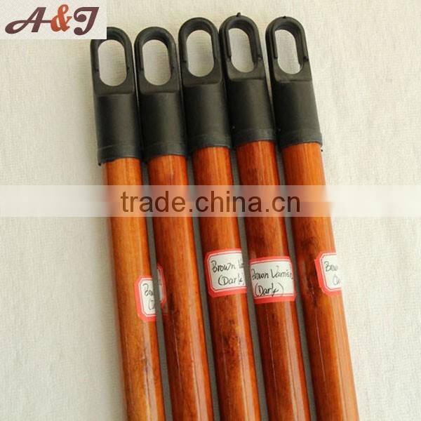 Two times painted wooden screw stick for broom rake