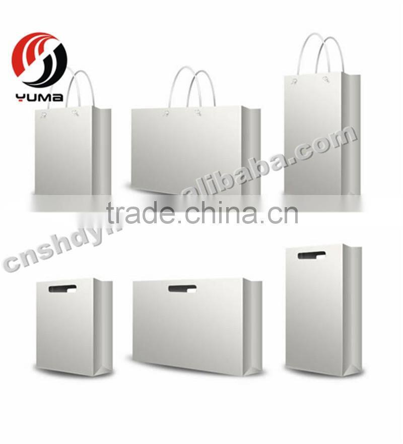 gold round cake board with tab paper bag