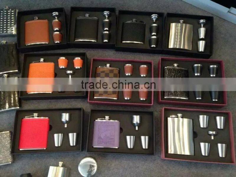 9oz and 18oz hip flask add to four cups and a Funnel in gift set box