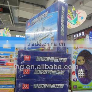 Vertical L type shrink wrapping machine