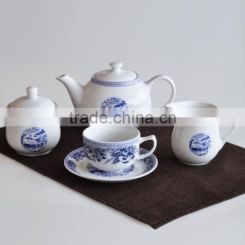 porcelain tea pot and cup and saucer set