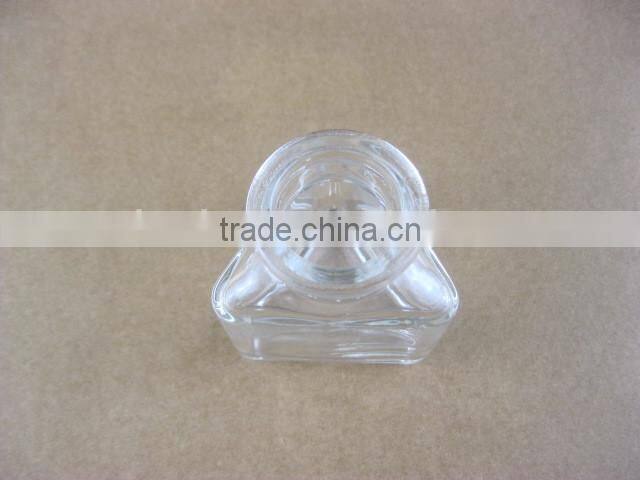 triangle shaped glass storage jar