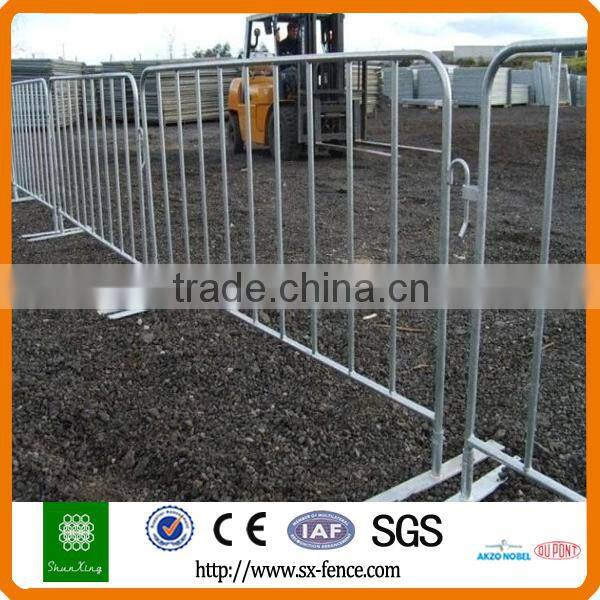 Yellow used road safety barrier, stage barrier