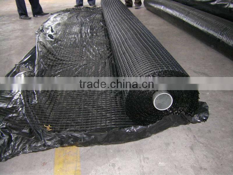 Bitumen coated fiberglass geogrid