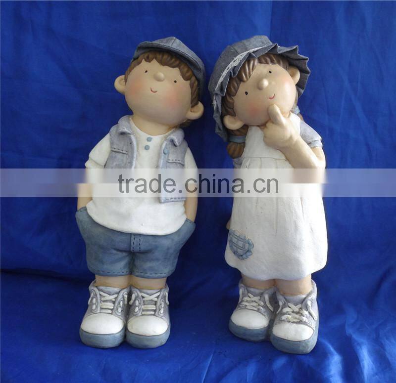 resin garden boy and girl statue