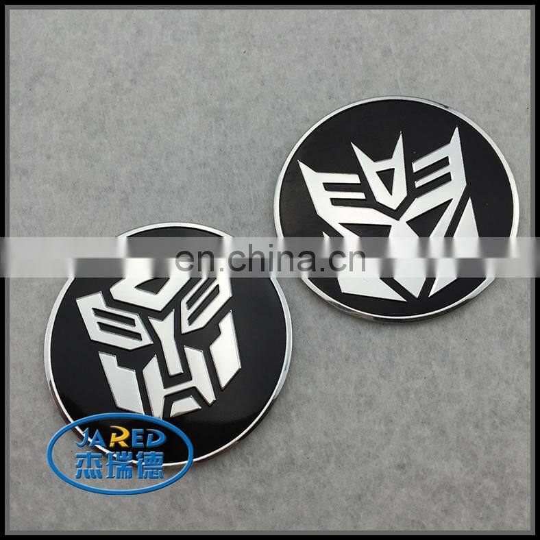 Chromed car logo emblem with adhesive tape