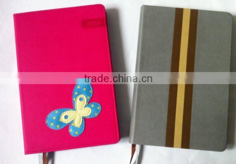 A5 PU leather hard cover notebook with foil stamping and embossing stars