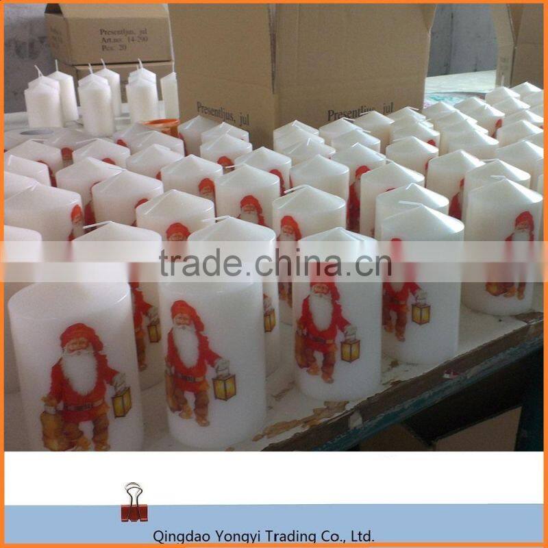 Christmas Pillar Candle For Sale; Decorative Candle For Christmas Day; White Pillar Candle With the Logo of Father Christmas