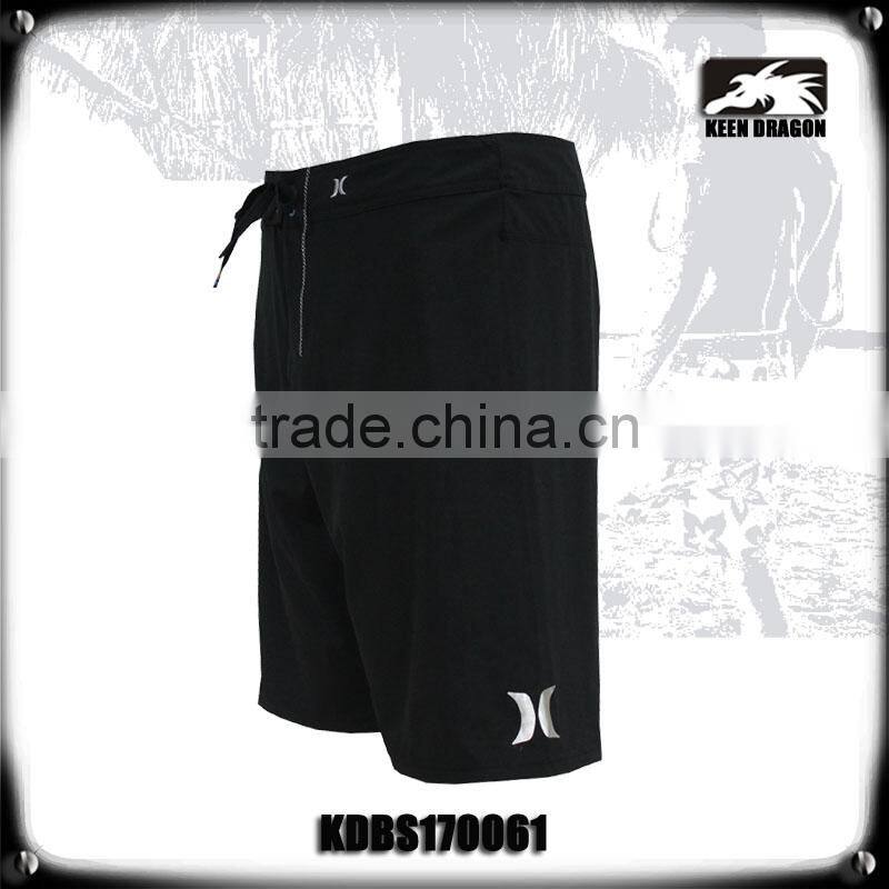 4 way stretch solid black board shorts