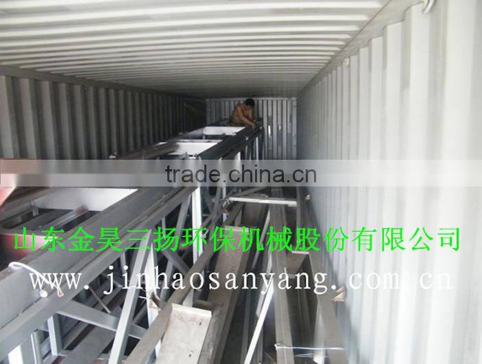 Sludge treatment bridge type sludge scraper