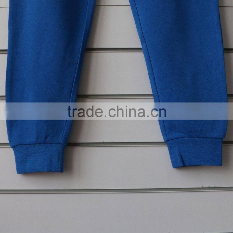 100% cotton men jogging pants with side waterproof pockets and logo print