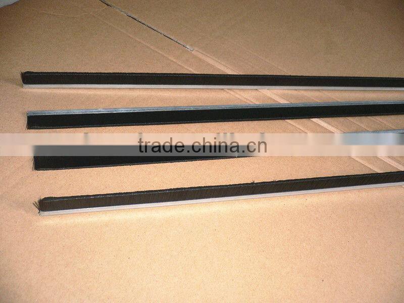 Metal channel flexible strip brush