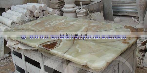 A GRADE LIGHT GREEN ONYX TABLE TOPS COLLECTION