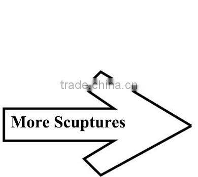 Garden playing boy and girl sculptures with teeterboard