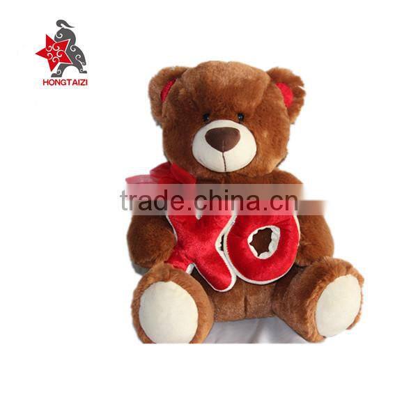 Stuffed soft plush bear with love heart