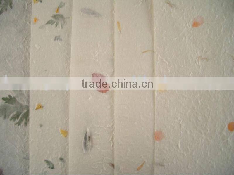 handmade paper with petals and leaves