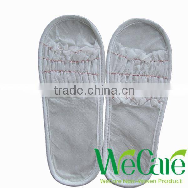 Cheap disposable non woven indoor hotel slippers with logo printed