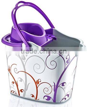 Plastic cleaning bucket very good design with plastic handle with its squeezer and 4 wheels under