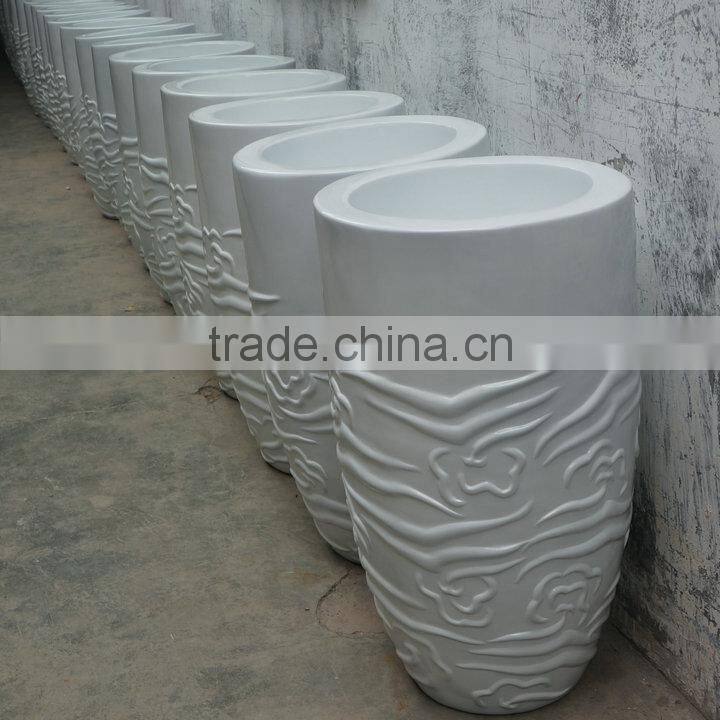 Modern white fiberglass planter