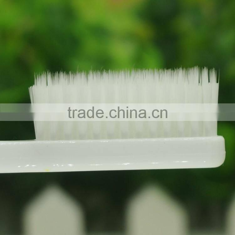 Dupont nylon rounded bristle Long rubber handle adult toothbrush