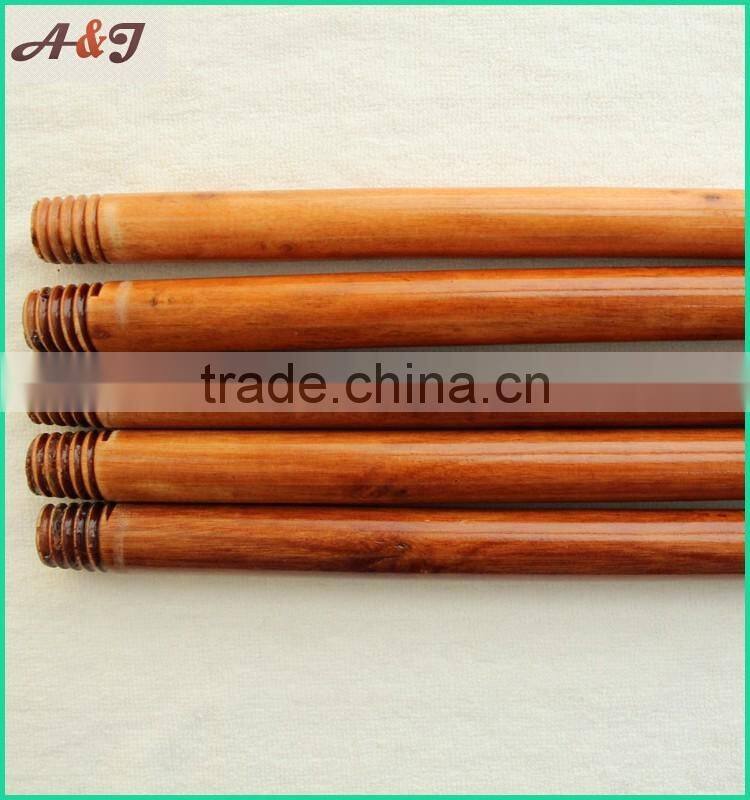 varnished wooden broom handle with long hanger