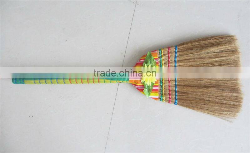grass broom with short wooden handle