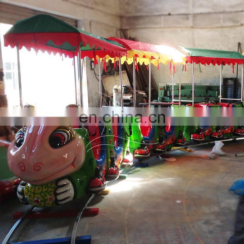 Hot kids riding mini electric train for amusement