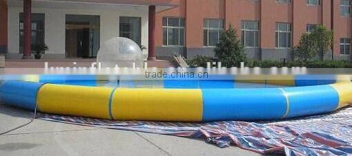 inflatable swimming pool floating on water deployed