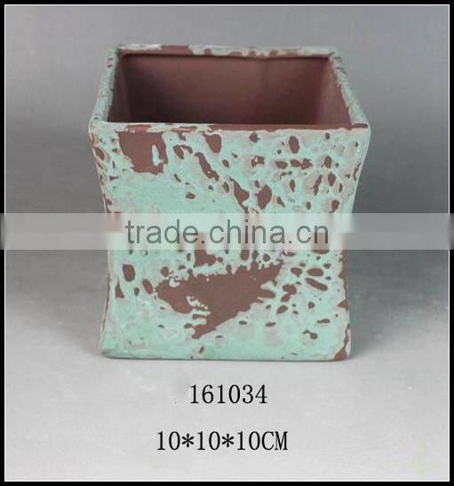 green glazed stoneware flower pot