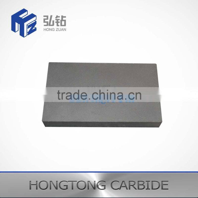Metal cutting tool of cemented carbide board plate