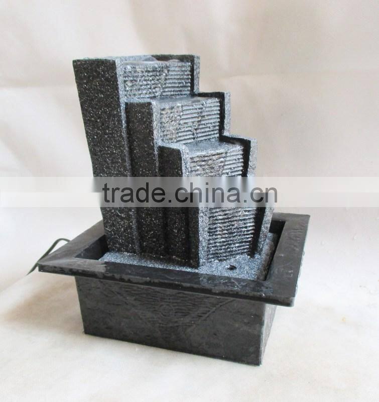 Resin table fountain with ladder statue