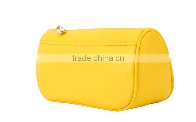 Yellow leather cosmetic bag special shape metal LOGO Since 1997