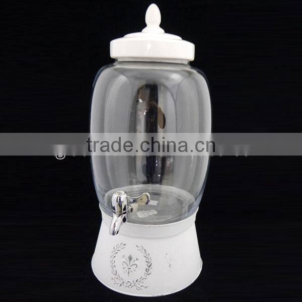 country style clear round juice dispenser with white metal ice bucket