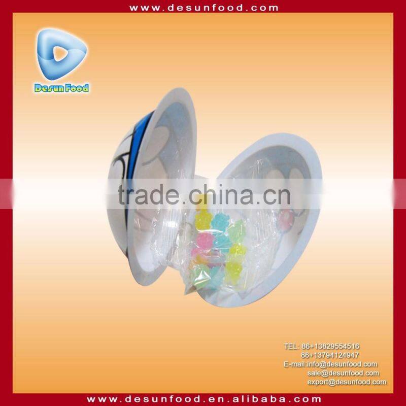 assorted cartoon design rotating face toy candy