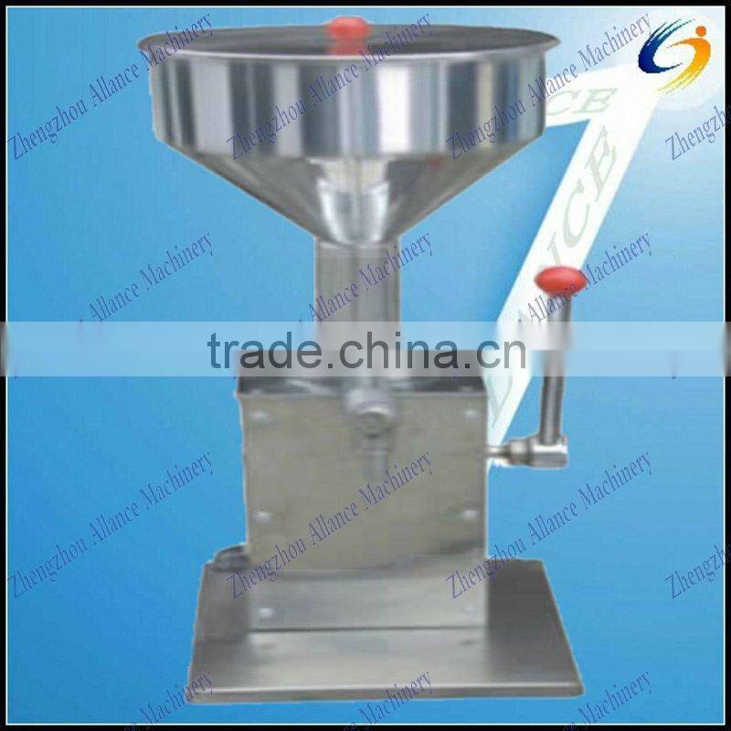 hand operated cosmetic cream filling machine