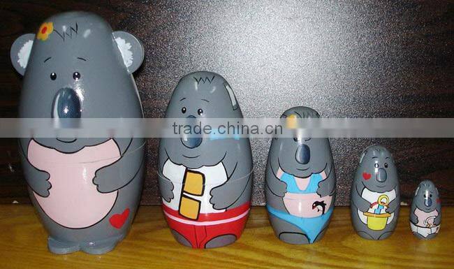 wooden russian doll , wooden nesting doll