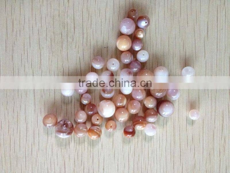 drilled American pink shell beads