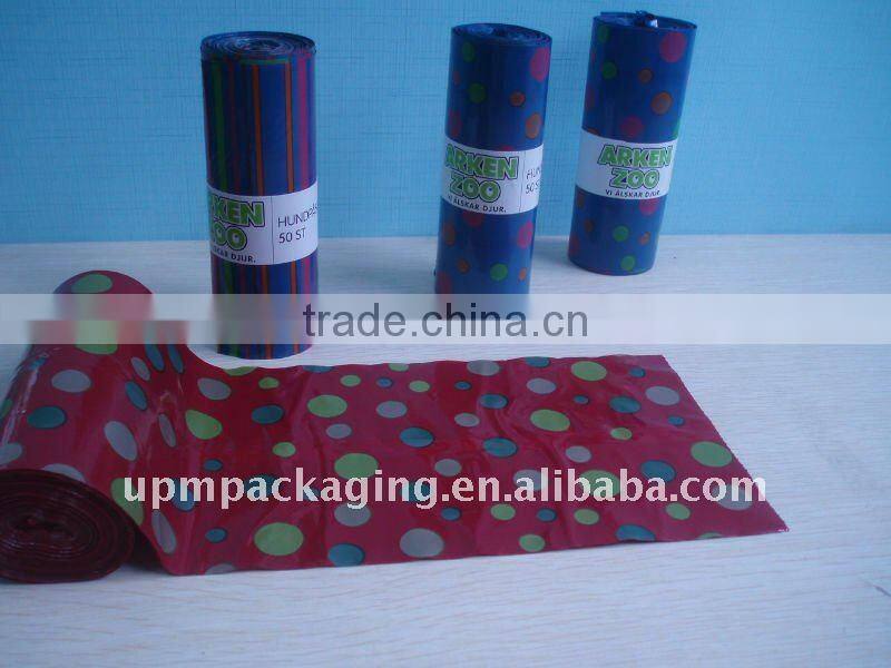 Colored plastic sack bag on roll for carry