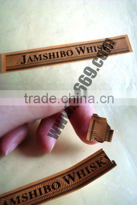 Brittle security seal sticker