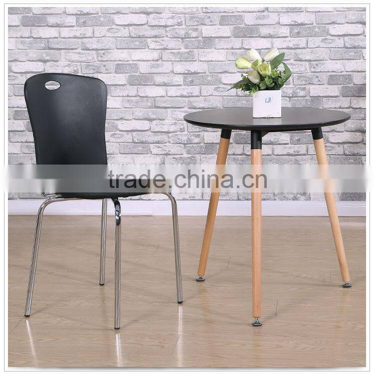 Black plastic dining chair with metal legs