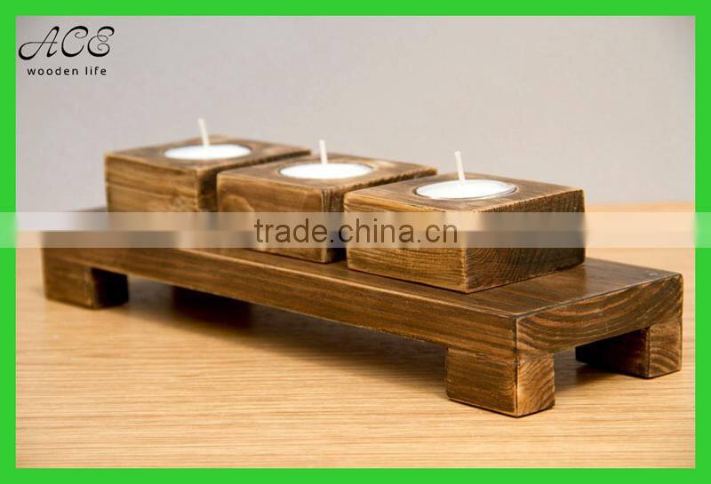 Antique wood candle holder