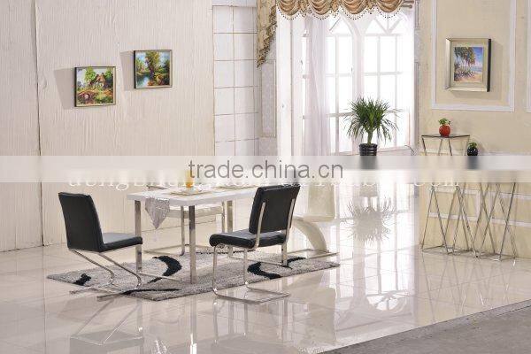 wooden dining table with stainless steel legs