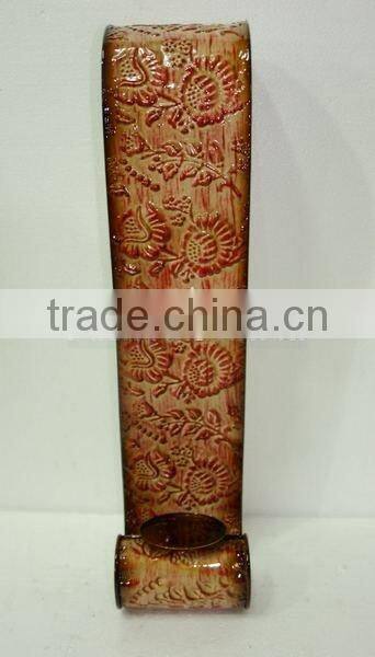 Wall- mounted iron candle holder