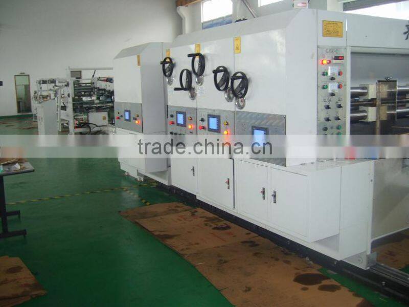 Automatic cardboard printing slotting packing machine