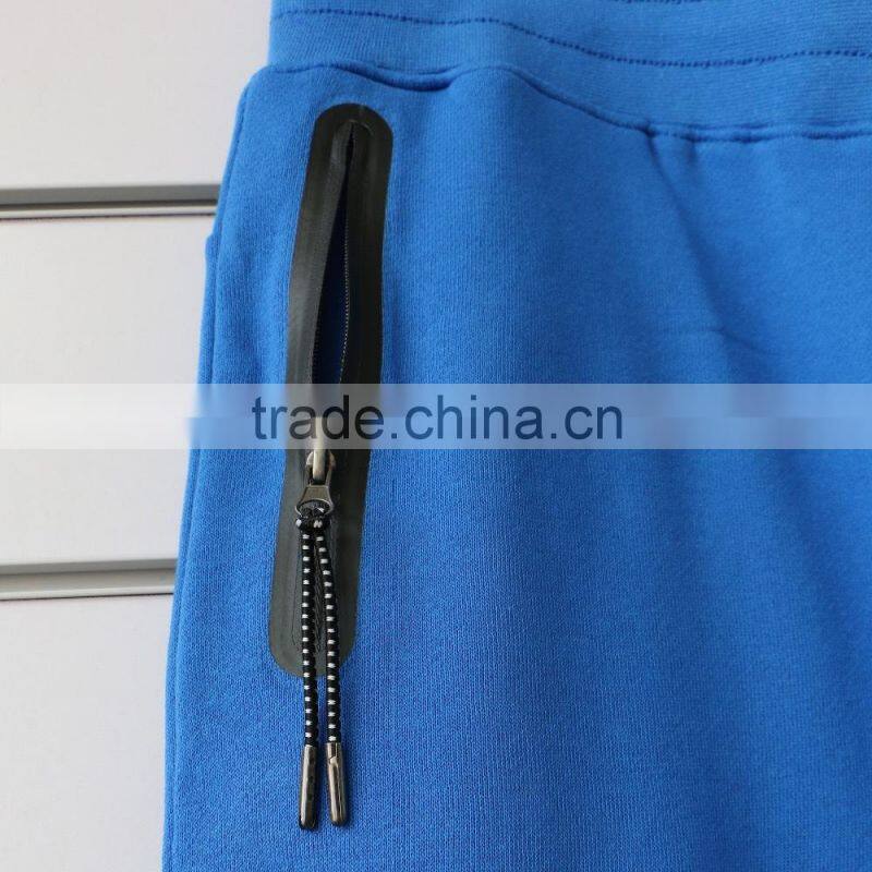 100% cotton men jogging pants with side waterproof pockets and logo print