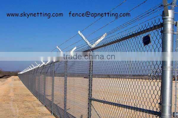 Chain link fence with barbed arms and fittings
