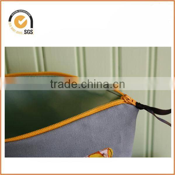 Cat Eye Glasses Appliqued Zipper Pouch/Makeup Bag: Light Blue Canvas with Yellow 1960s Floral with Rhinestones By Chiqun