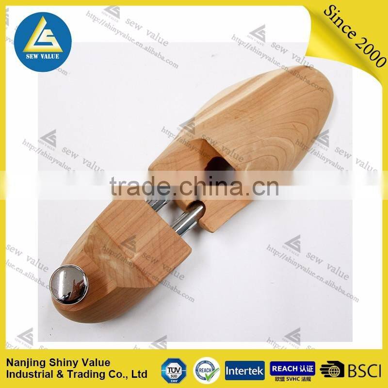 Irregular shape double tube shoe tree type wooden shoe stretcher with silver metal cap and tube