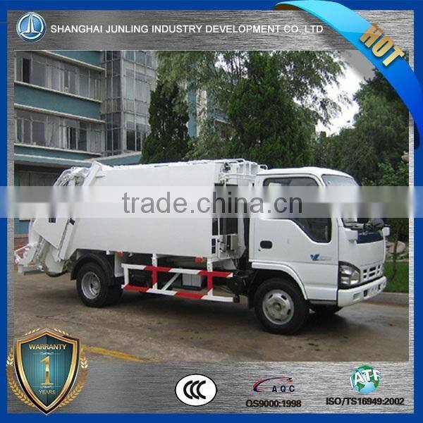 NPR 4X2 garbage compactor truck price