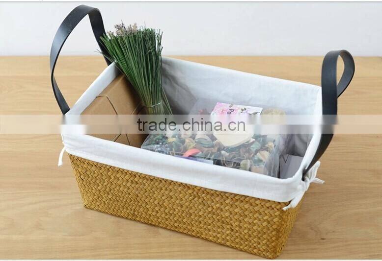basket made of natural straw seagrass for housewaring with handle and lining